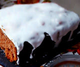 Cocoa, citrum and figs cake together with a white chocolate cream