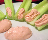 Celery stalks with ham steak cream